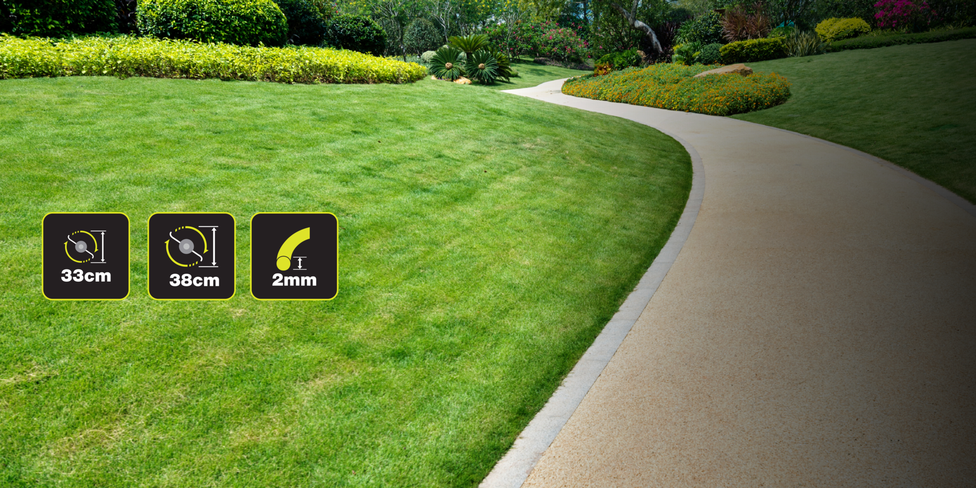 Green lawn with curving footpath and flower beds in background