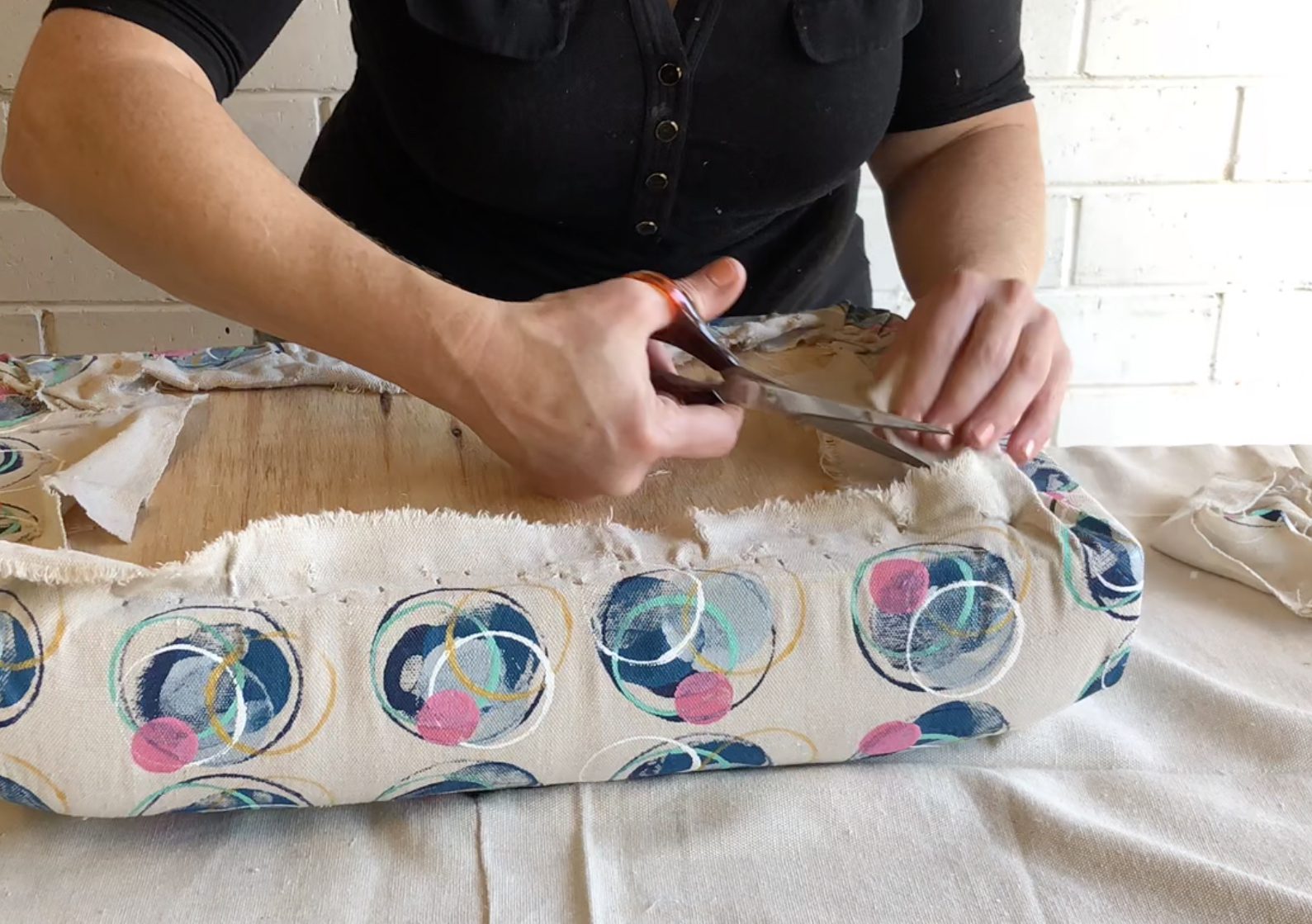 Trim the excess fabric with scissors