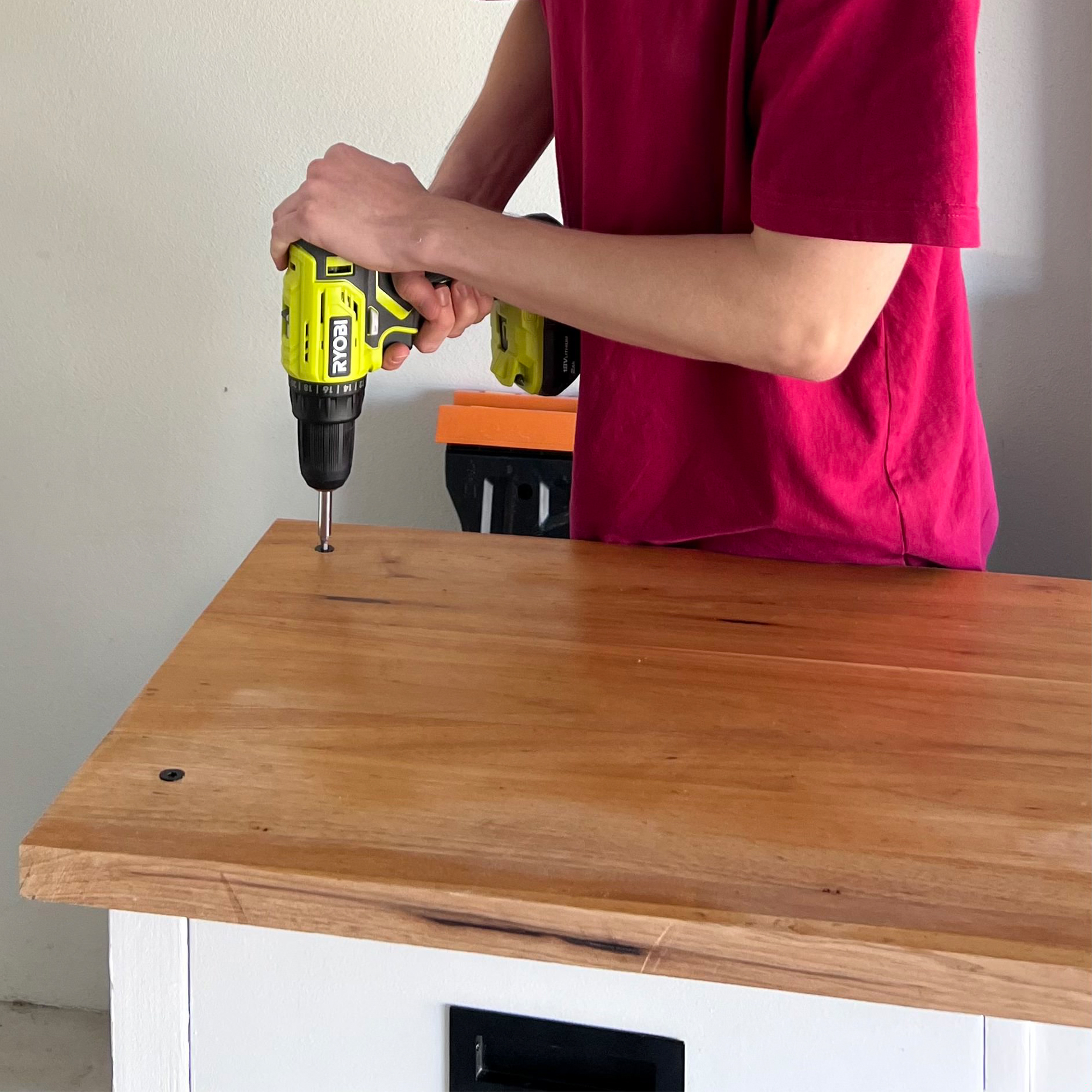 Using a RYOBI Drill to secure benchtop