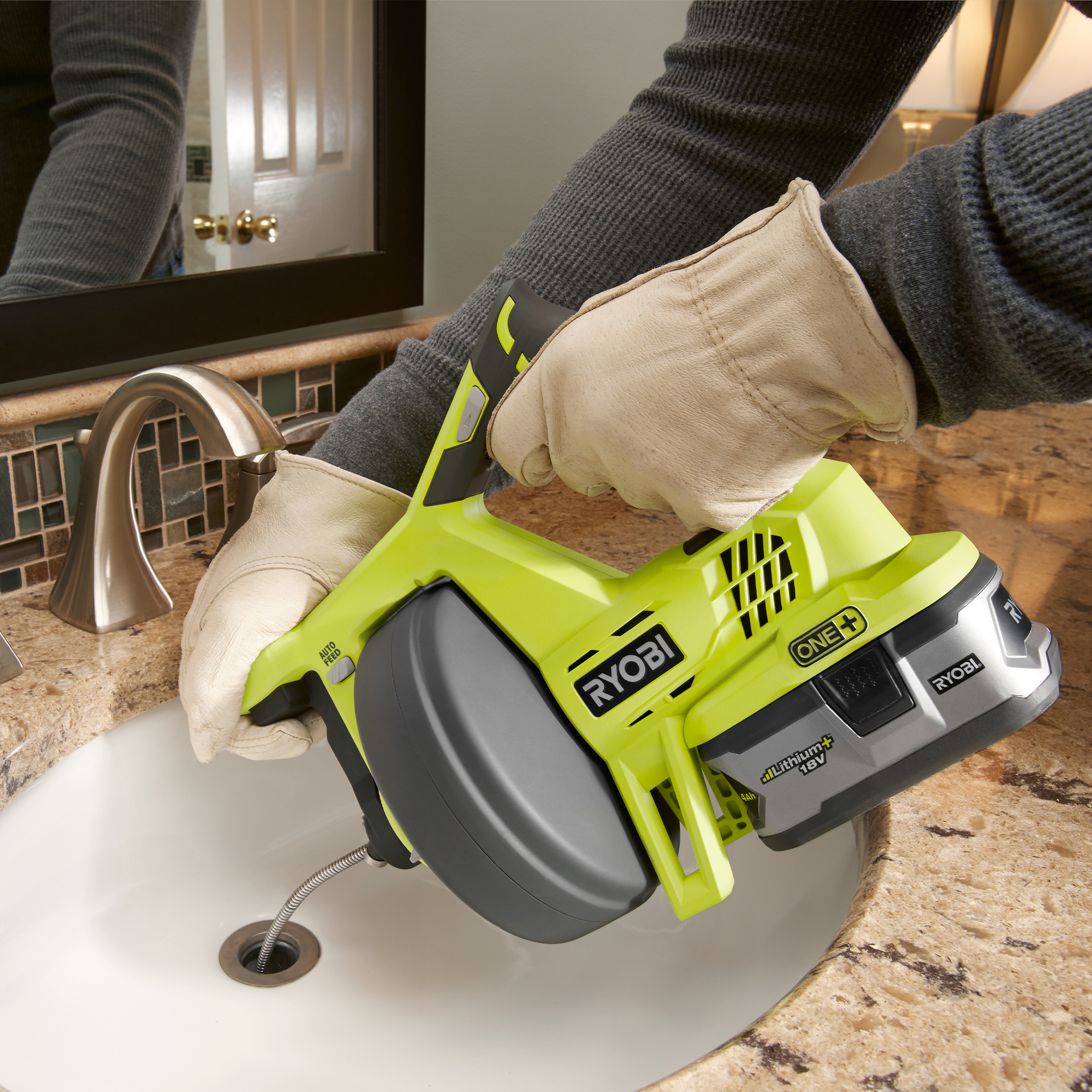 RYOBI ONE+ Drain Auger clearing blocked bathroom drain