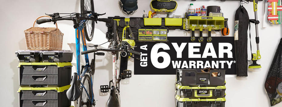 'Get a 6 year warranty' poster on a wall behind a collection of RYOBI Link