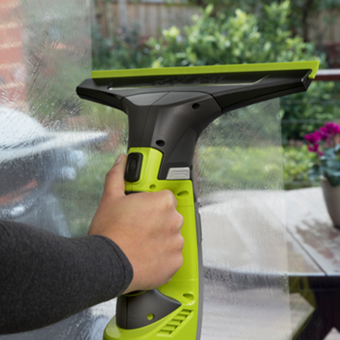 Using a RYOBI window vac to clean and outdoor window