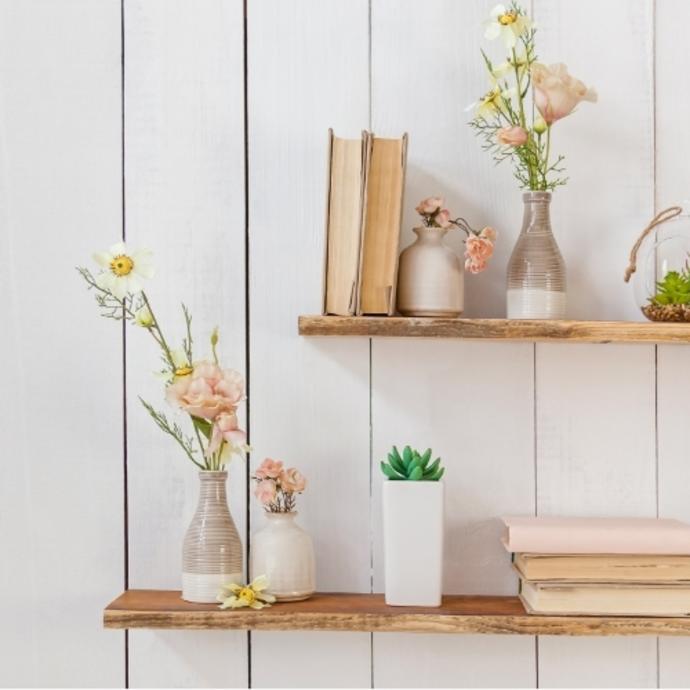 Two DIY, wooden floating bookshelves